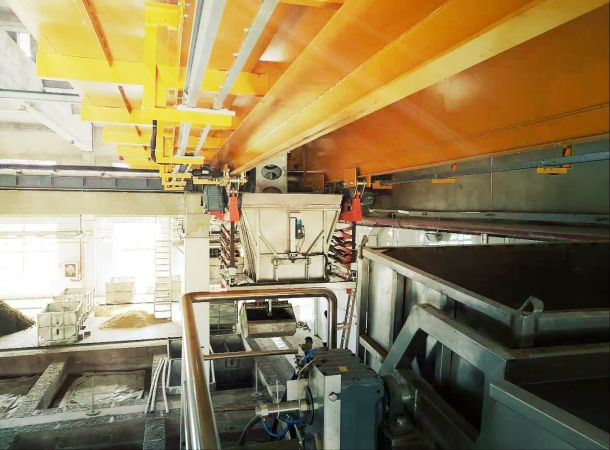 第四代：數(shù)控抓斗、料斗起重機(jī)